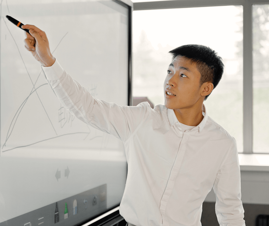 man presenting in business meeting 